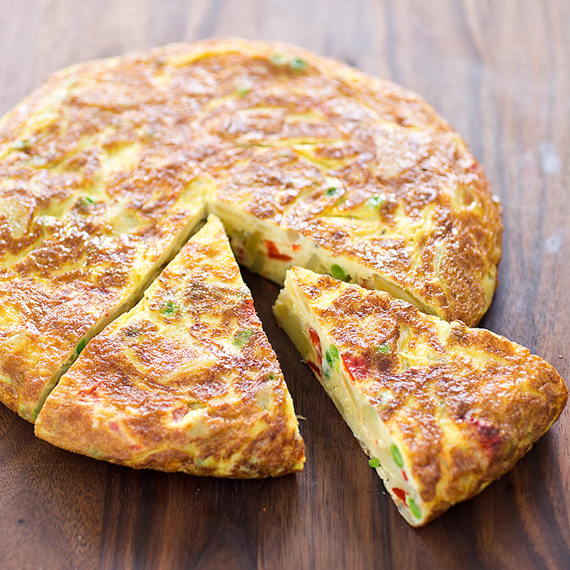 Spanish Tortilla with Roasted Red Peppers and Peas | America's Test Kitchen Recipe