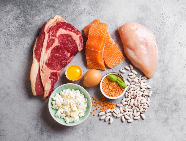Premium Photo | Assortment of natural sources of protein from food: meat,  fish, chicken, dairy products, eggs, beans. diet, healthy eating, wellness,  bodybuilding concept, top view, stone background